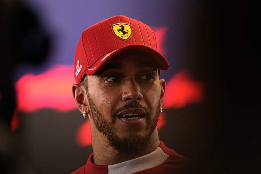 Ferrari driver Lewis Hamilton of Britain reacts after the Formula One Abu Dhabi Grand Prix at the Yas Marina Circuit in Abu Dhabi, UAE, Sunday, Dec. 7, 2025. (AP Photo/Fatima Shbair)