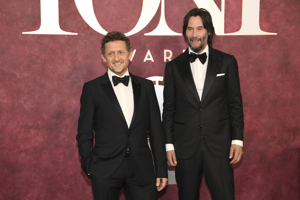 FILE - Alex Winter, left, and Keanu Reeves arrive at the 78th Tony Awards in New York on June 8, 2025. (Photo by Evan Agostini/Invision/AP, File)