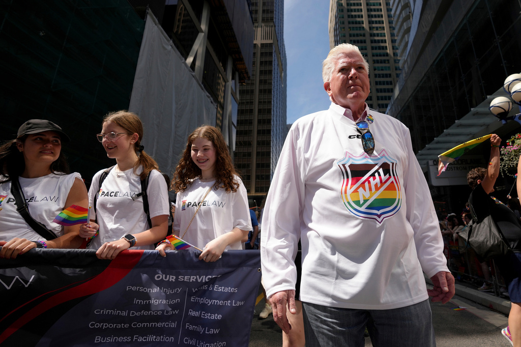 FILE - Former NHL hockey executive Brian Burke walks in the Toronto Pride Parade, June 25, 2023. (Chris Young/The Canadian Press via AP, File)