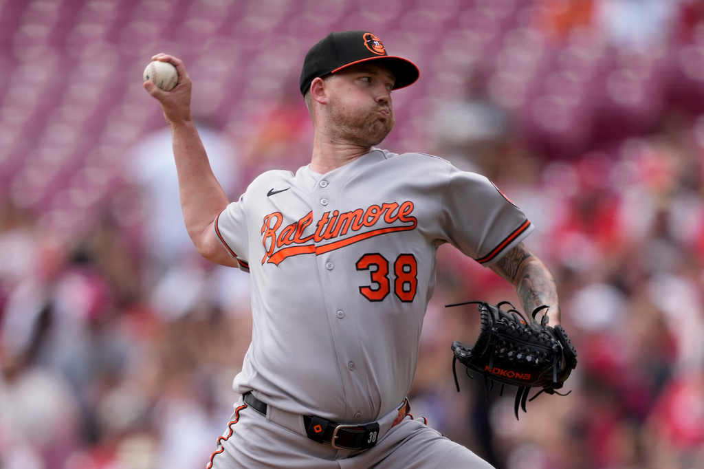 Baltimore Orioles pitcher Kyle Bradish throws during the first inning of a baseball game against Cincinnati Reds in Cincinnati, Sunday, July 5, 2026. (AP Photo/Carolyn Kaster)