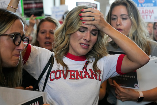 FILE - Covenant School parent Mary Joyce is overcome with emotion as she speaks outside the House chamber a special session of the state legislature on public safety adjourned, Aug. 29, 2023, in Nashville, Tenn. (AP Photo/George Walker IV, file) FILE - Covenant School parent Mary Joyce is overcome with emotion as she speaks outside the House chamber a special session of the state legislature on public safety adjourned, Aug. 29, 2023, in Nashville, Tenn. (AP Photo/George Walker IV, file)