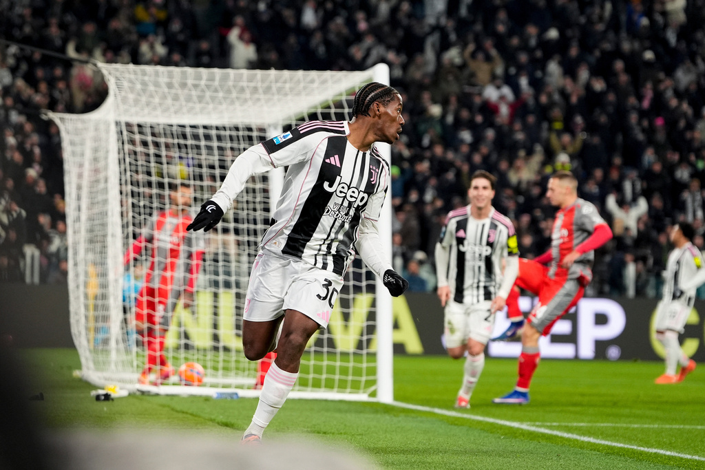 Juventus' Jonathan David celebrates after scoring his side's second goal during the Serie A soccer match between Juventus and Cremonese in Turin, Italy, Jan. 12, 2026. (Fabio Ferrari/LaPresse via AP)