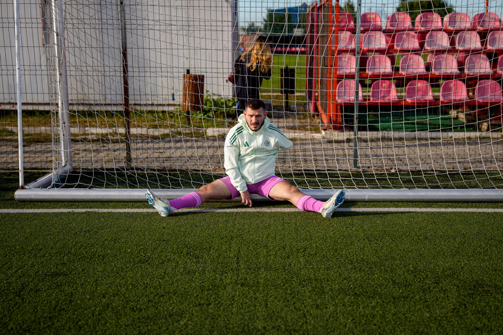 Maccabi Haifa's Trigan Chagava stretches before an amputee soccer match between Maccabi Haifa and Panathinaikos in the inaugural EAFF Conference League in Bucharest, Romania, Thursday, Sept. 24, 2026. (AP Photo/Andreea Alexandru)