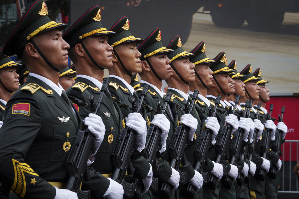 People's Liberation Army of China march during a military parade rehearsal for the Vietnam's 80th National Day celebration in Hanoi, Vietnam, Saturday, Aug. 30, 2025. (AP Photo/Vincent Thian)