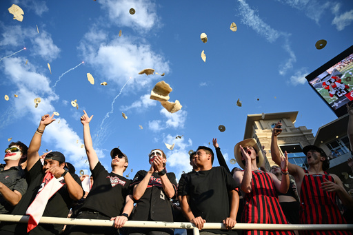 Texas Tech students throw tortillas before the NCAA college football game against Kansas, Saturday, Oct. 11, 2025, in Lubbock, Texas. (AP Photo/Annie Rice) Texas Tech students throw tortillas before the NCAA college football game against Kansas, Saturday, Oct. 11, 2025, in Lubbock, Texas. (AP Photo/Annie Rice)