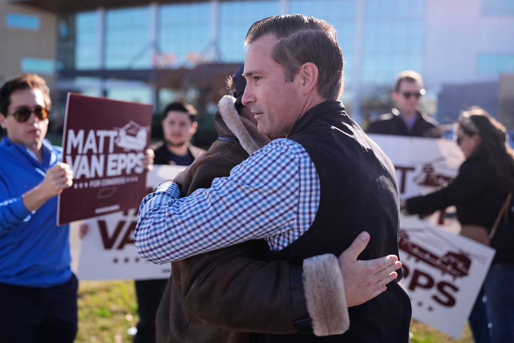 Republican congressional candidate Matt Van Epps hugs a supporter during a campaign event in the special election for the seventh district Wednesday, Nov. 12, 2025, in Nashville, Tenn. (AP Photo/George Walker IV)