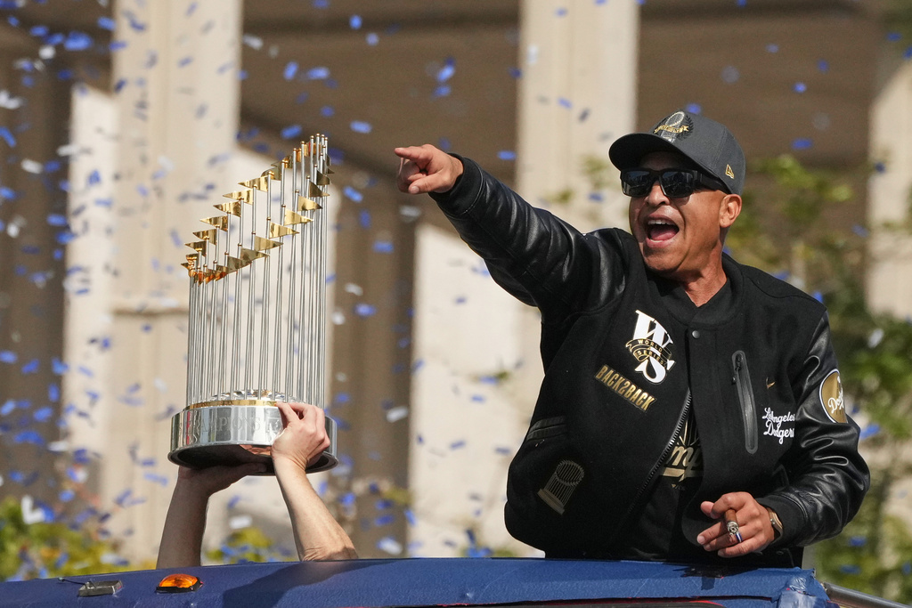Los Angels Dodgers manager Dave Roberts celebrates during a parade to celebrate the baseball team's World Series win on Monday, Nov. 3, 2025, in Los Angeles. (AP Photo/Jae C. Hong)