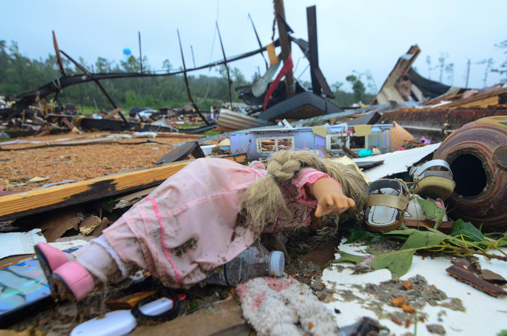 A doll and other items are seen amid the destruction at Gene’s Mobile Home Supply, a trailer park in Bogue Chitto, Miss., on Thursday, May 7, 2026, after a tornado cut across the state. (Matt WIlliamson/Enterprise-Journal via AP)