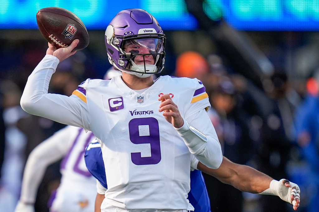 Minnesota Vikings quarterback J.J. McCarthy (9) passes against the New York Giants during the first quarter of an NFL football game, Sunday, Dec. 21, 2025, in East Rutherford, N.J. (AP Photo/Seth Wenig)