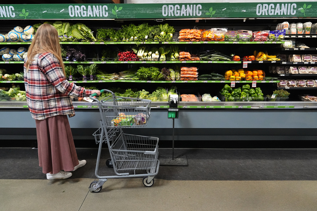 A person shops for produce, which is covered by the USDA Supplemental Nutrition Assistance Program (SNAP), at a grocery store in Baltimore, Monday, Nov. 10, 2025. (AP Photo/Stephanie Scarbrough)