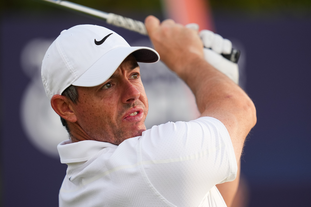 Rory McIlroy, of Northern Ireland, tees off the 11th hole during the first round of the Australian Open golf tournament in Melbourne, Australia, Thursday, Dec. 4, 2025. (AP Photo/Asanka Brendon Ratnayake)