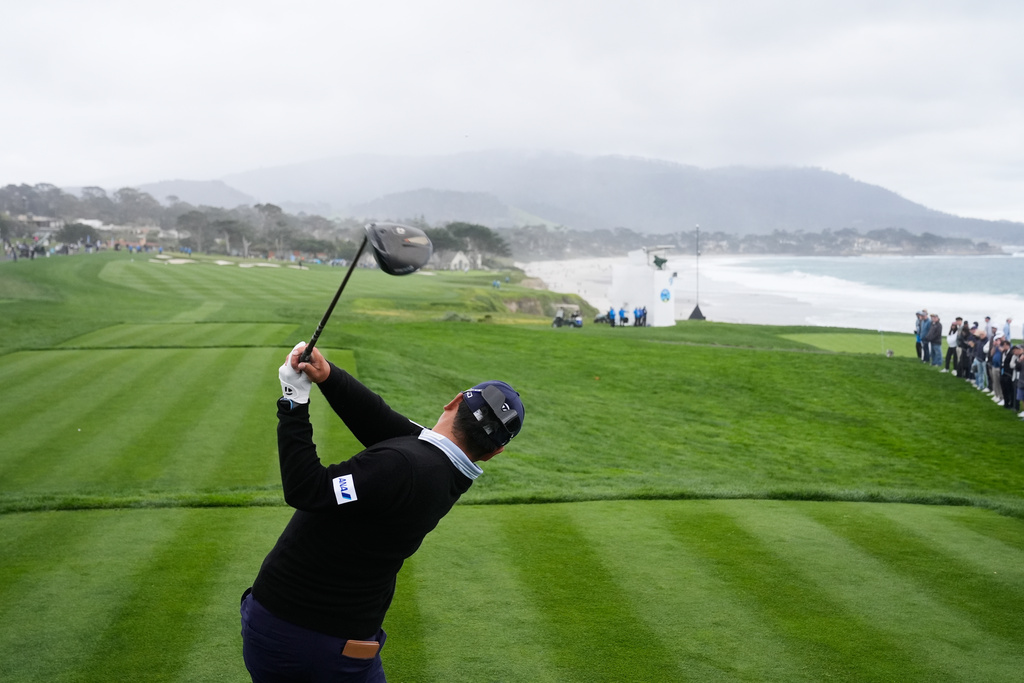 Ryo Hisatsune, from Japan, hits from the 10th tee at Pebble Beach Golf Links during the third round of the AT&T Pebble Beach Pro-Am golf tournament, Saturday, Feb. 14, 2026, in Pebble Beach, Calif. (AP Photo/Godofredo A. Vásquez)