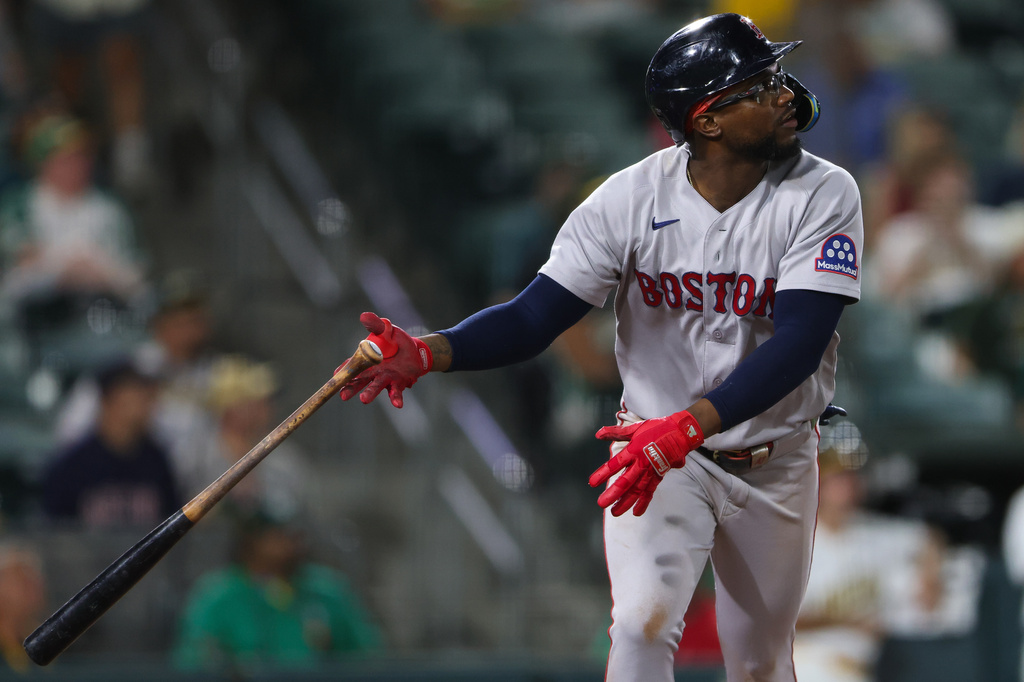 Boston Red Sox's Andruw Monasterio watches his two-run home run during the 10th inning of a baseball game against the Athletics Wednesday, July 29, 2026, in West Sacramento, Calif. (AP Photo/Scott Marshall)