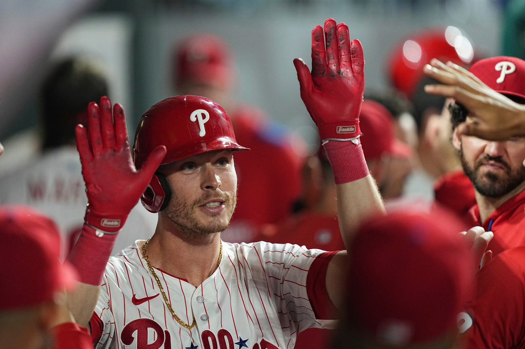 FILE - Philadelphia Phillies' Max Kepler celebrates after hitting a home run off of New York Mets pitcher Ryan Helsley during the eighth inning of a baseball game, on Sept. 10, 2025, in Philadelphia. (AP Photo/Matt Rourke, File)