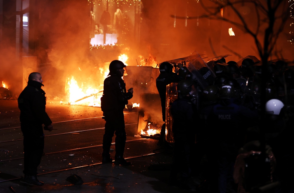 Police clash with protesters during a rally against austerity measures in next year's draft budget, in Sofia, Monday, Dec 1, 2025. (AP Photo/Valentina Petrova)