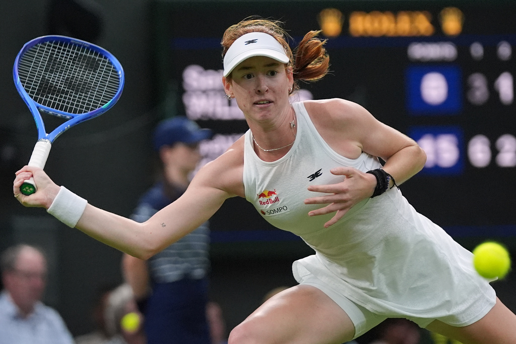 Maya Joint of Australia returns the ball to Serena Williams of the United States in their first round women's singles match at the Wimbledon Tennis Championships in London, Tuesday, June 30, 2026. (AP Photo/Maja Smiejkowska)