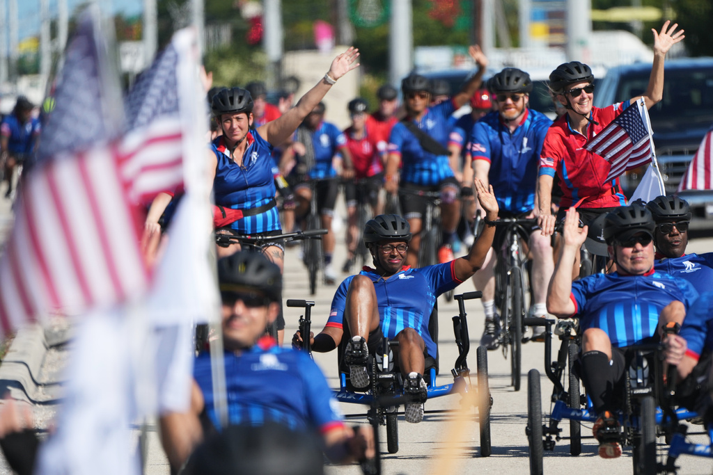 Wounded veterans ride in the annual Florida Keys Soldier Ride organized by the Wounded Warrior Project, Friday, Jan. 9, 2026, in Marathon, Fla. (AP Photo/Lynne Sladky)