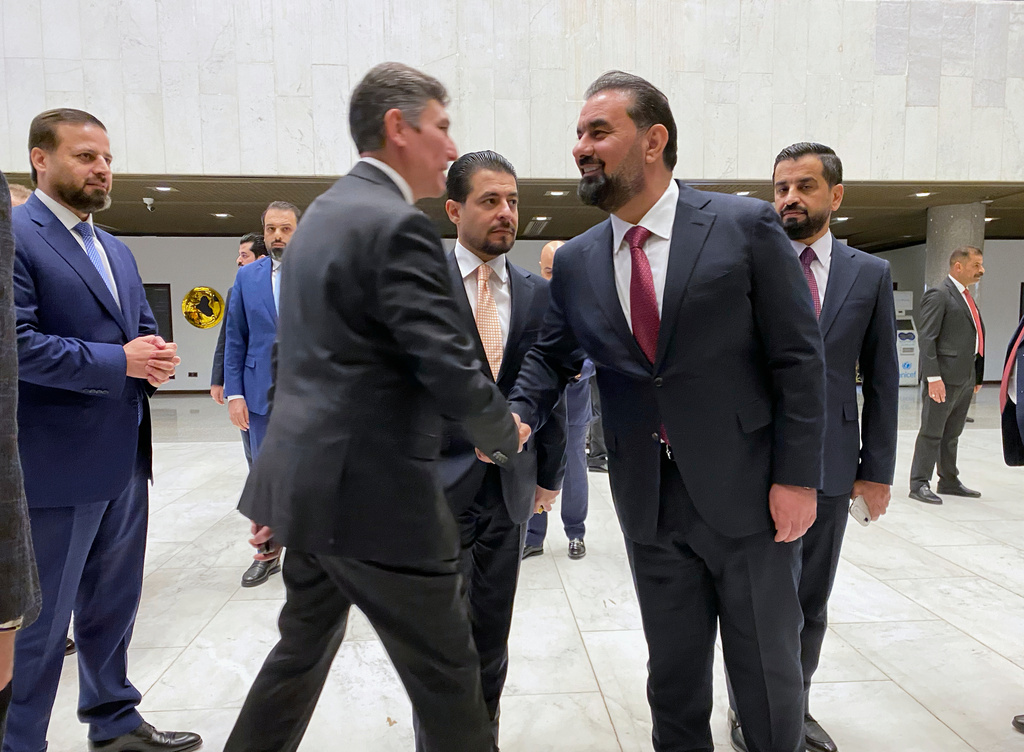 Members of the new Iraqi Parliament are seen before the start of their first legislative session in Baghdad, Iraq, Monday, Dec. 29, 2025. (AP Photo/Hadi Mizban)