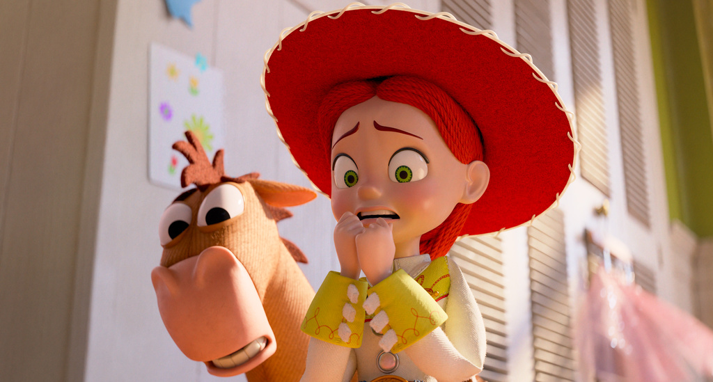 This image released by Disney shows characters Bullseye, left, and Jessie, voiced by Joan Cusack, in a scene from Disney and Pixar's "Toy Story 5." (Disney/Pixar via AP)
