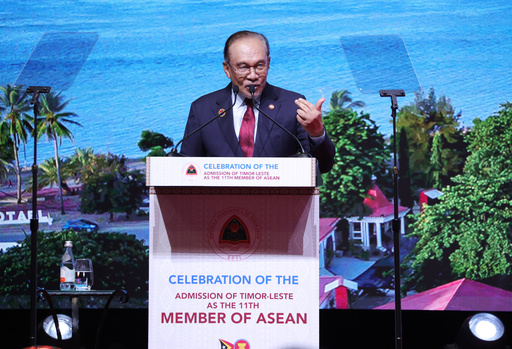 Malaysia's Prime Minister Anwar Ibrahim delivers his speech during a reception for East Timor's admission to ASEAN on the sidelines of the Association of Southeast Asian Nations (ASEAN) summit at the Kuala Lumpur Convention Centre in Kuala Lumpur, Malaysia, Monday, Oct. 27, 2025. (How Hwee Young/Pool Photo via AP) Malaysia's Prime Minister Anwar Ibrahim delivers his speech during a reception for East Timor's admission to ASEAN on the sidelines of the Association of Southeast Asian Nations (ASEAN) summit at the Kuala Lumpur Convention Centre in Kuala Lumpur, Malaysia, Monday, Oct. 27, 2025. (How Hwee Young/Pool Photo via AP)
