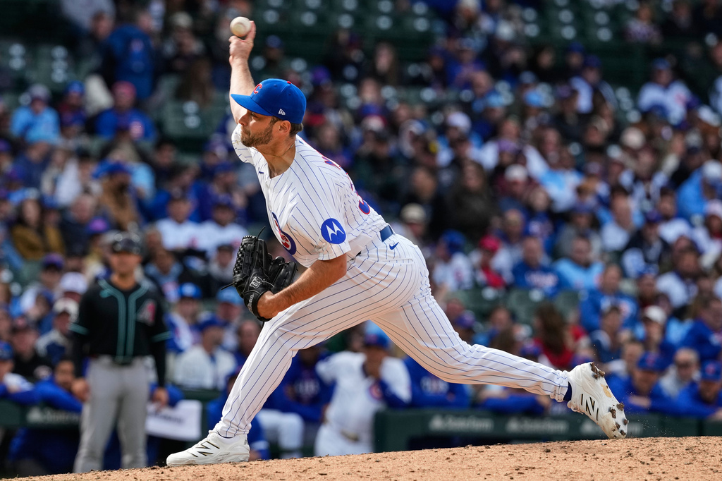 Chicago Cubs relief pitcher Corbin Martin throws against the Arizona Diamondbacks during the ninth inning of a baseball game in Chicago, Sunday, May 3, 2026. (AP Photo/Nam Y. Huh)