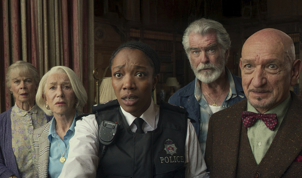 This image released by Netflix shows, from left, Celia Imrie, Helen Mirren, Naomi Ackie, Pierce Brosnan, and Ben Kingsley in a scene from "The Thursday Murder Club." (Netflix via AP)
