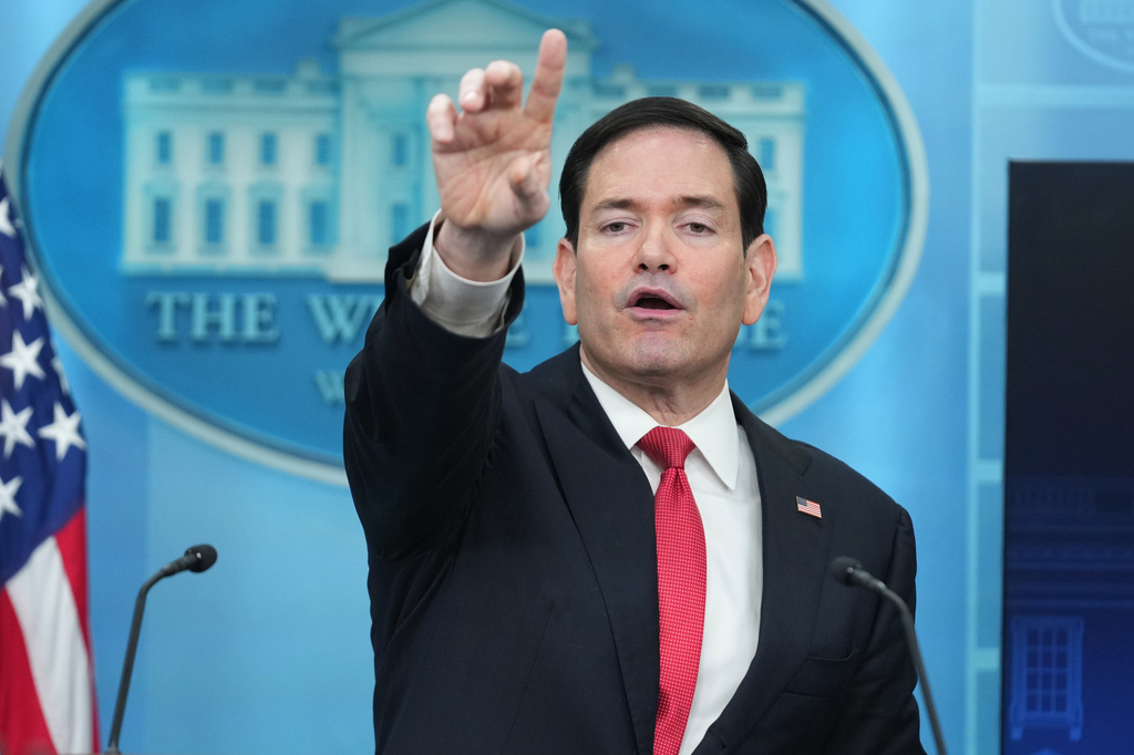 Secretary of State Marco Rubio points to a reporter to ask a question during a press briefing in the James Brady Press Briefing Room at the White House in Washington, Tuesday, May 5, 2026. (AP Photo/Mark Schiefelbein)