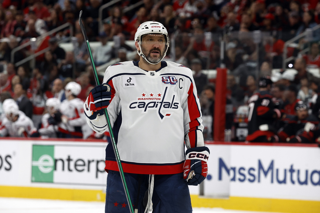 FILE - Washington Capitals' Alex Ovechkin (8) watches the puck against the Carolina Hurricanes during the first period of Game 3 of an NHL hockey Semi-final round playoff series in Raleigh, N.C., May 10, 2025. (AP Photo/Karl DeBlaker, File)