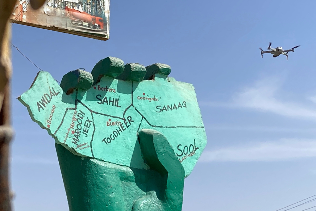 A drone buzzes over a statue in the Somaliland capital of Hargeisa, Feb. 9, 2022. (AP Photo/Cara Anna)
