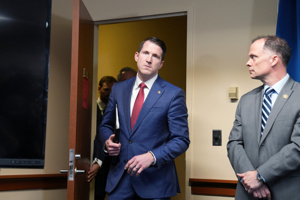 Assistant Attorney General for the Fraud Division Colin McDonald arrives for a press conference Thursday, May 21, 2026, in Minneapolis. (AP Photo/Glen Stubbe)