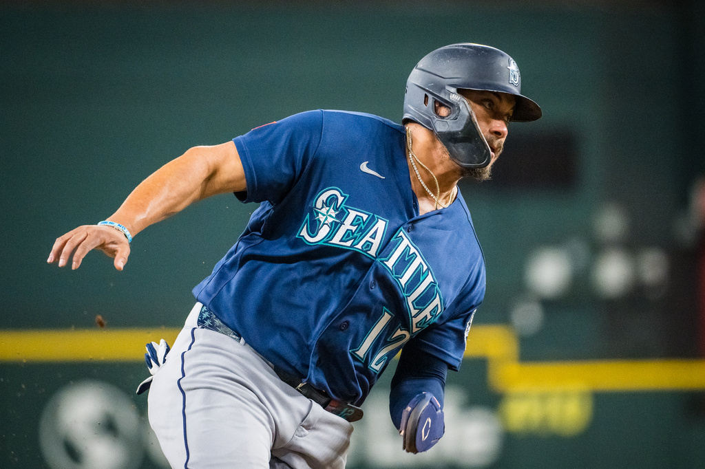 Seattle Mariners' Josh Naylor runs towards home during the second inning of a baseball game against the Texas Rangers, Friday, July 24, 2026, Arlington, Texas. (AP Photo/Jessica Tobias)