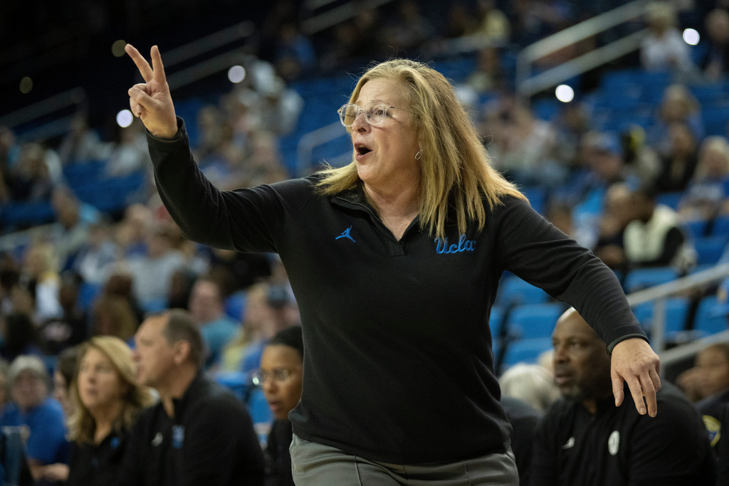 UCLA head coach Cori Close gestures to her players during the first half of an NCAA college basketball game against UC Santa Barbara, Thursday, Nov. 6, 2025, in Los Angeles. (AP Photo/Kyusung Gong)