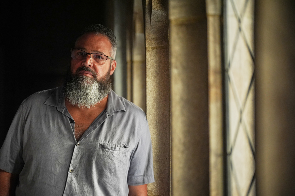Greg Andreotti, who was formerly incarcerated at the Minnesota Correctional Facility in Lino Lakes, Minn., stands for a portrait at the office of the Minnesota Incarcerated Workers Organizing Committee, Tuesday, Sept. 15, 2026, in St. Paul, Minn. (AP Photo/Ellen Schmidt)