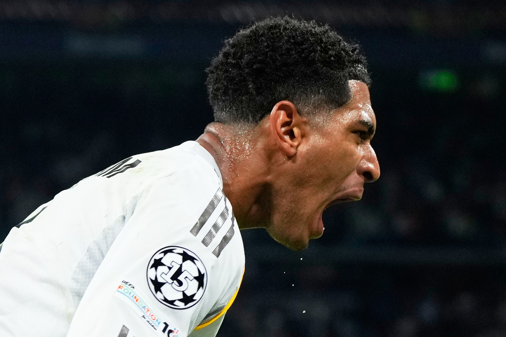 Real Madrid's Jude Bellingham celebrates after scoring his sides first goal during the Champions League opening phase soccer match between Real Madrid and Juventus in Madrid, Spain, Wednesday, Oct. 22, 2025. (AP Photo/Manu Fernandez)