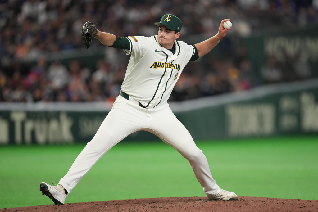 Australia's pitcher Jon Kennedy throws the ball against Taiwan in the seventh inning of a World Baseball Classic game in Tokyo, Thursday, March 5, 2026. (AP Photo/Hiro Komae)