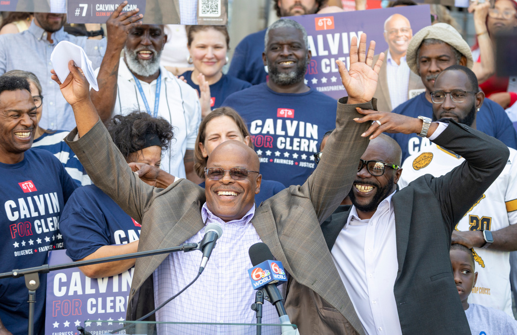 FILE - Calvin Duncan, center, stands with supporters on the steps of Orleans Parish Criminal Court to speak about his ambitions to be the next Clerk of Court, Oct. 2, 2025. (Chris Granger/The Times-Picayune/The New Orleans Advocate via AP, File)