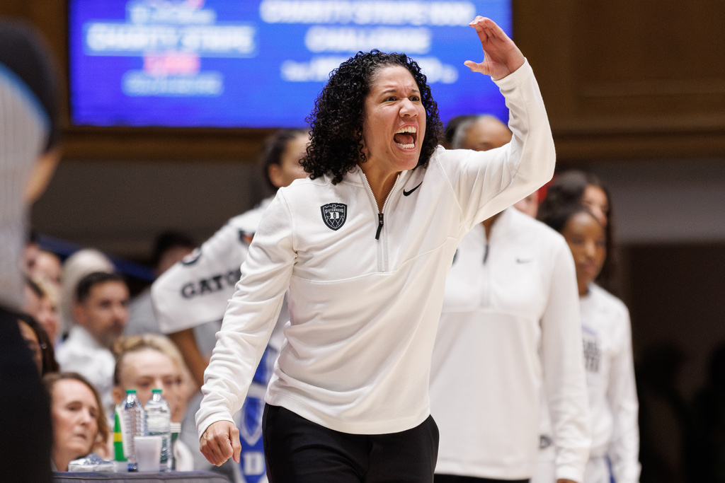 Duke head coach Kara Lawson directs her team during the first half of an NCAA college basketball game against LSU in Durham, N.C., Thursday, Dec. 4, 2025. (AP Photo/Ben McKeown)
