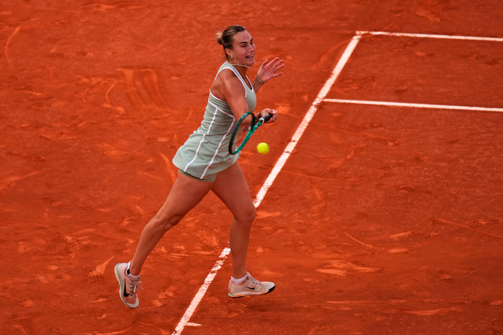 Aryna Sabalenka of Belarus returns the ball to Hailey Baptiste of the U.S. during the Madrid Open tennis tournament in Madrid, Tuesday, April 28, 2026. (AP Photo/Manu Fernandez)