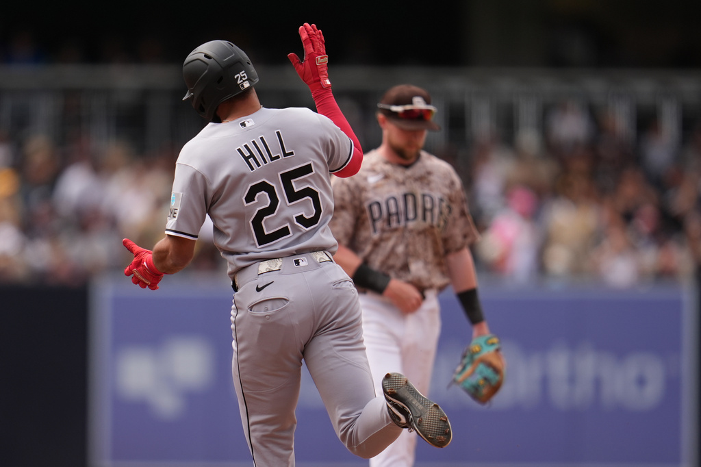 Chicago White Sox's Derek Hill (25) celebrates his two-run home run during the seventh inning of a baseball game against the San Diego Padres Sunday, May 3, 2026, in San Diego. (AP Photo/Gregory Bull)
