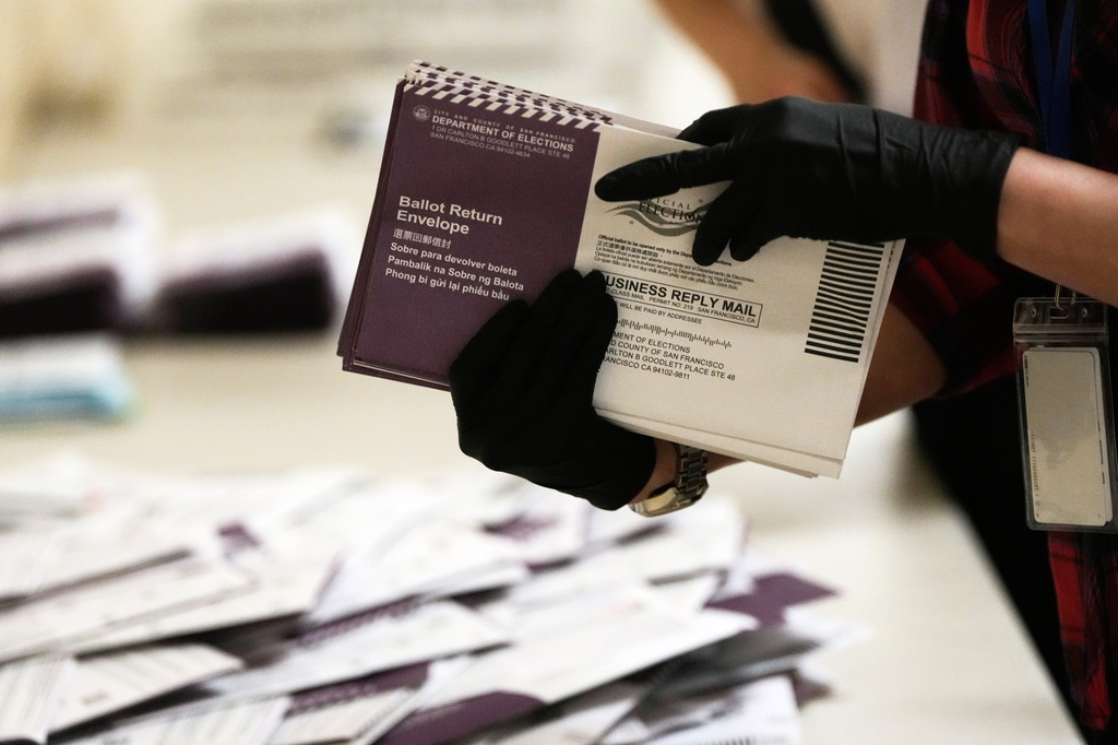 FILE - Department of Elections workers sort mail-in ballots for the California primary election at City Hall on Tuesday, June 2, 2026, in San Francisco. (AP Photo/Jeff Chiu, File)