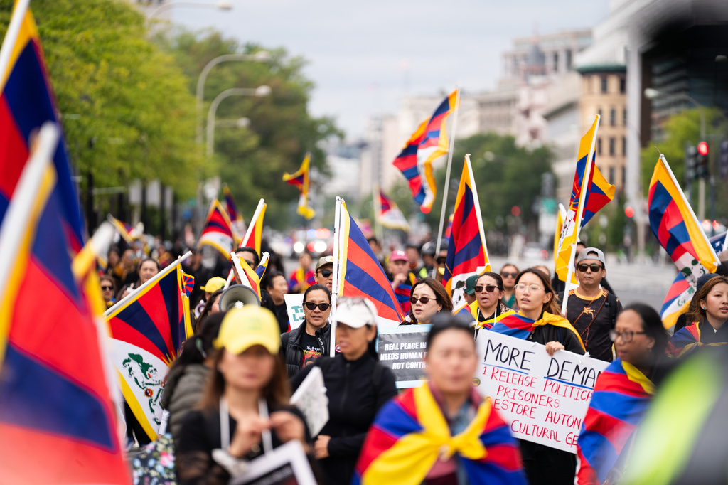 Pro-Tibet independence protestors demonstrate near the U.S. Capitol while China's President Xi Jinping visits the White House, Thursday, Sept. 24, 2026, in Washington. (AP Photo/Allison Robbert)