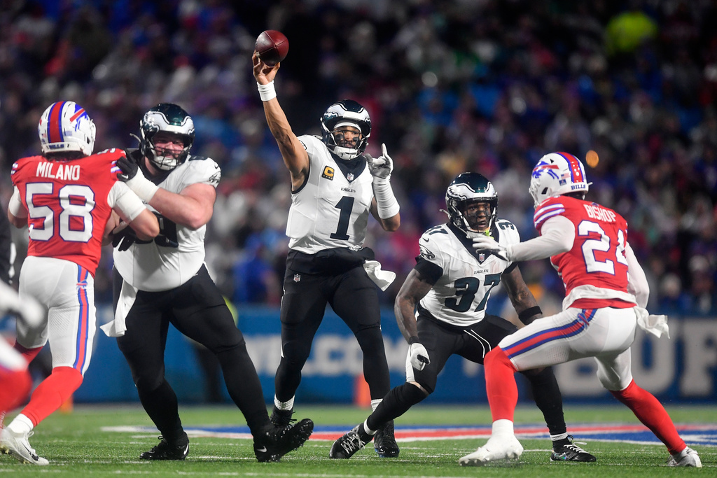 Philadelphia Eagles' Jalen Hurts passes during the first half of an NFL football game against the Buffalo Bills, Sunday, Dec. 28, 2025, in Buffalo, N.Y. (AP Photo/Adrian Kraus)