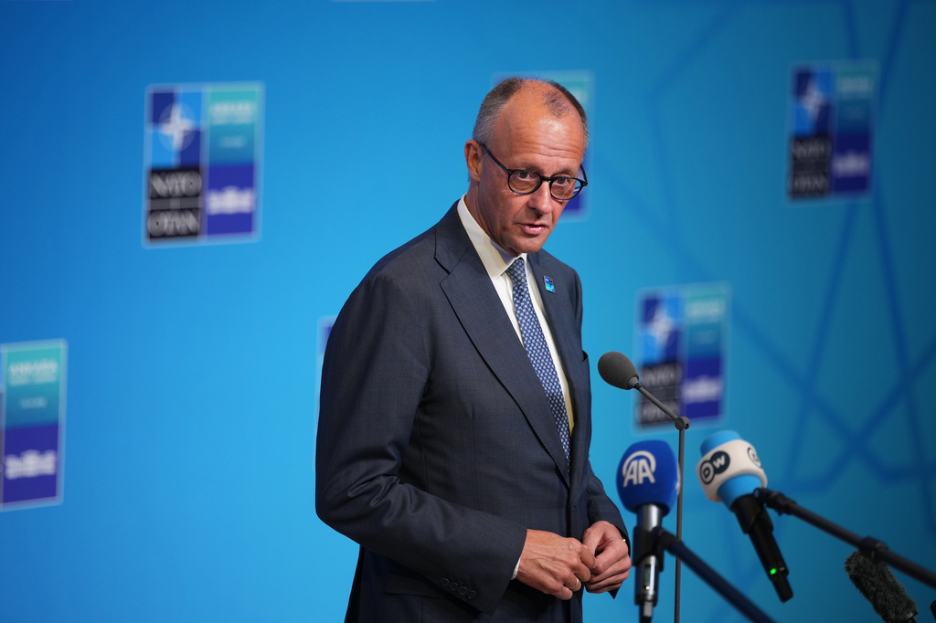 Germany's Chancellor Friedrich Merz speaks with the media as he arrives for the NATO summit in Ankara, Turkey, Wednesday, July 8, 2026. (AP Photo/Emrah Gurel)