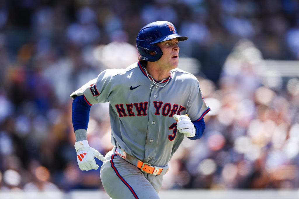 New York Mets' Carson Benge runs the bases after hitting a solo home run against the San Diego Padres in the sixth inning of a baseball game Sunday, June 7, 2026, in San Diego. (AP Photo/Derrick Tuskan)