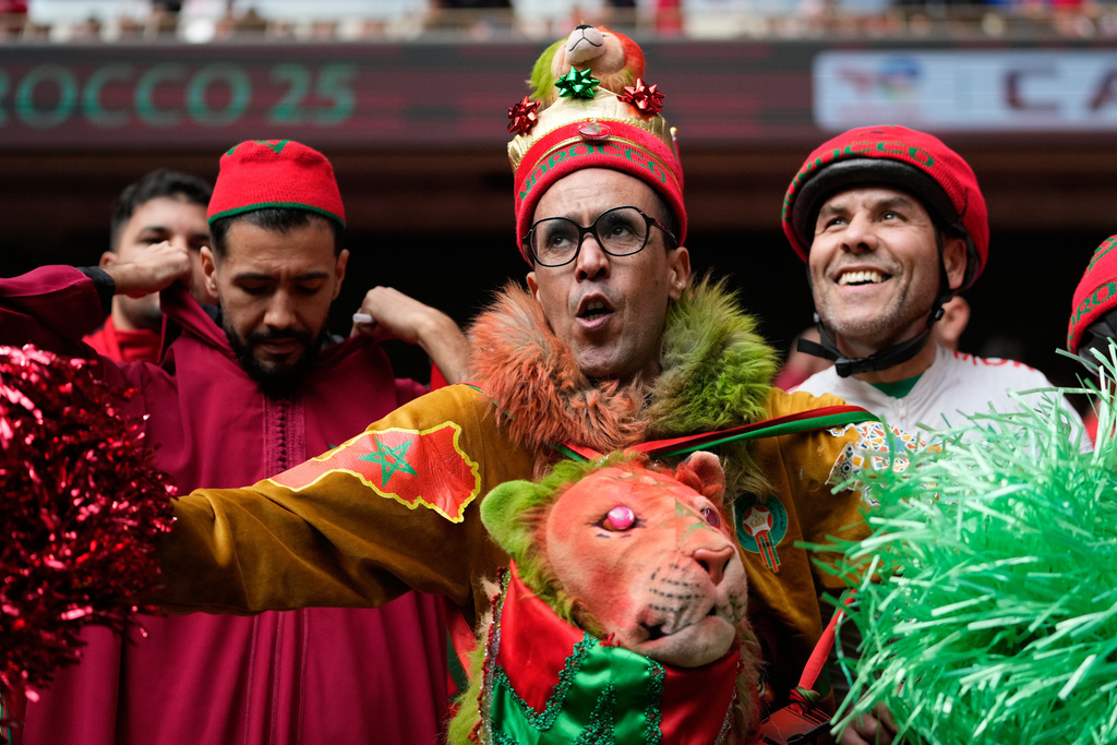 Moroccan supporters react as they wait for the start of the Africa Cup of Nations round of 16 soccer match between Morocco and Tanzania in Rabat, Morocco, Sunday, Jan. 4, 2026. (AP Photo/Mosa'ab Elshamy)