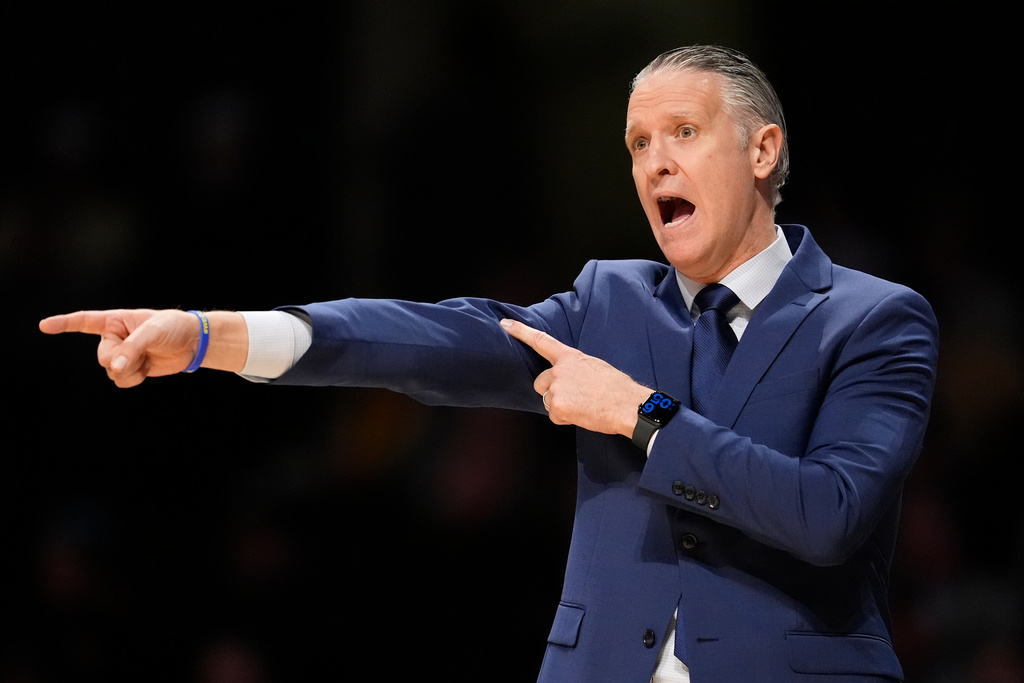 New Haven head coach Ted Hotaling yells to his players during the first half of an NCAA college basketball game against Vanderbilt, Monday, Dec. 29, 2025, in Nashville, Tenn. (AP Photo/George Walker IV)