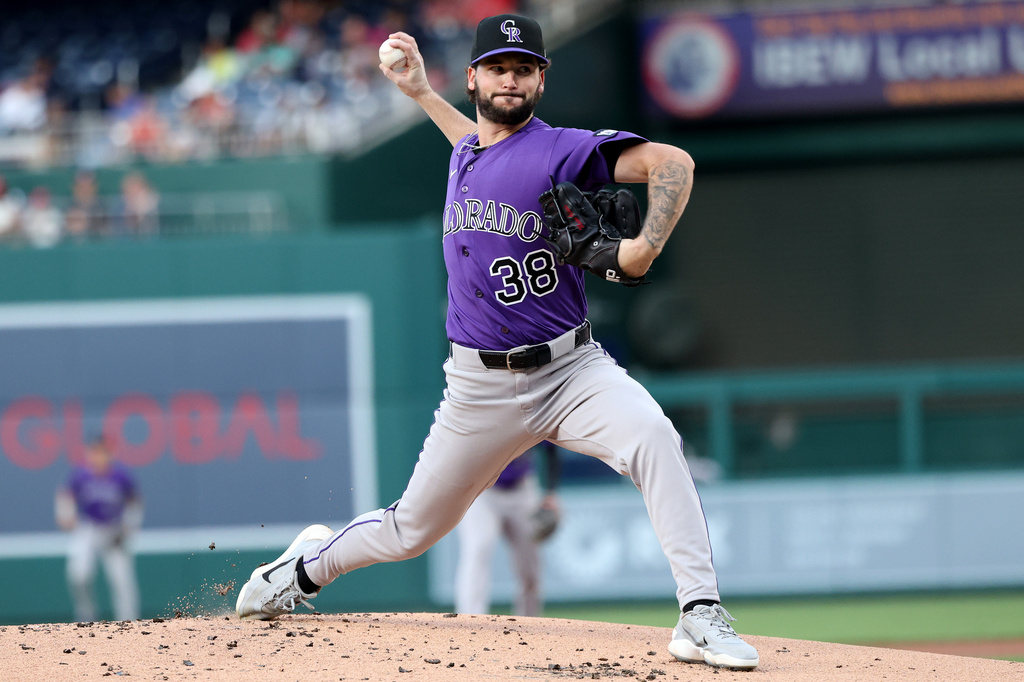 Colorado Rockies pitcher Mason Adams throws during the first inning of a baseball game against the Washington Nationals, Tuesday, Aug. 25, 2026, in Washington. (AP Photo/Daniel Kucin Jr.)