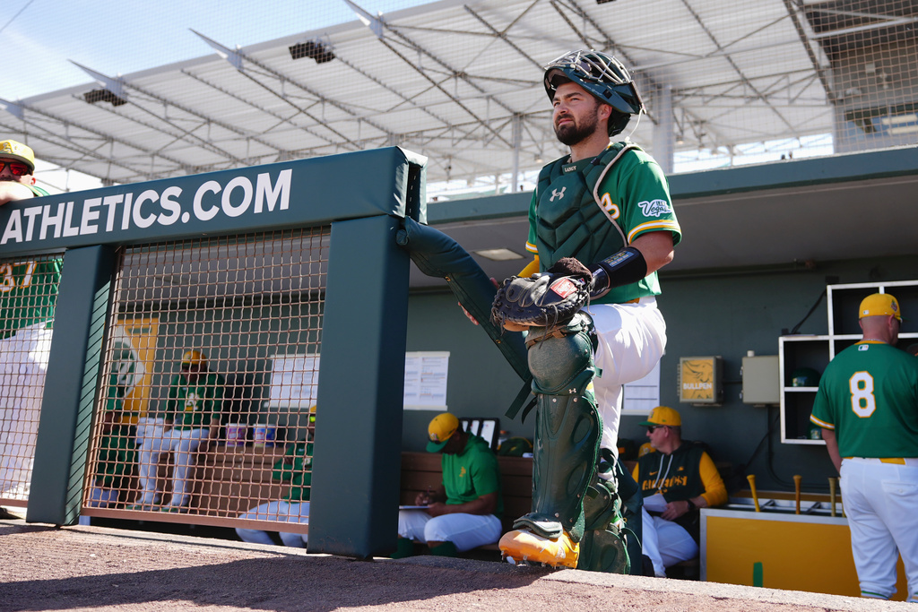 Athletics' Shea Langeliers waits to run on the field prior to a spring training baseball game against the Milwaukee Brewers Tuesday, Feb. 24, 2026, in Mesa, Ariz. (AP Photo/Ross D. Franklin)