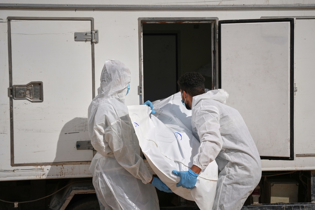 Israel returns 15 Palestinian bodies to Gaza, where displaced families…