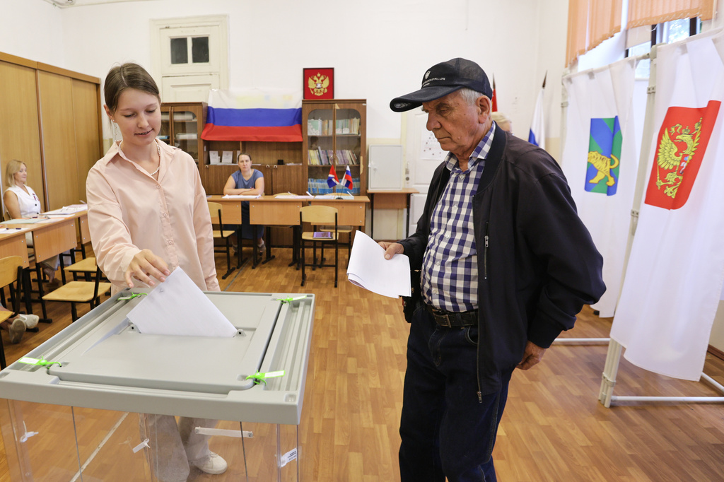 Voters cast their ballot for the parliamentary election in Vladivostok, Russia, Friday, Sept. 18, 2026. (AP Photo)